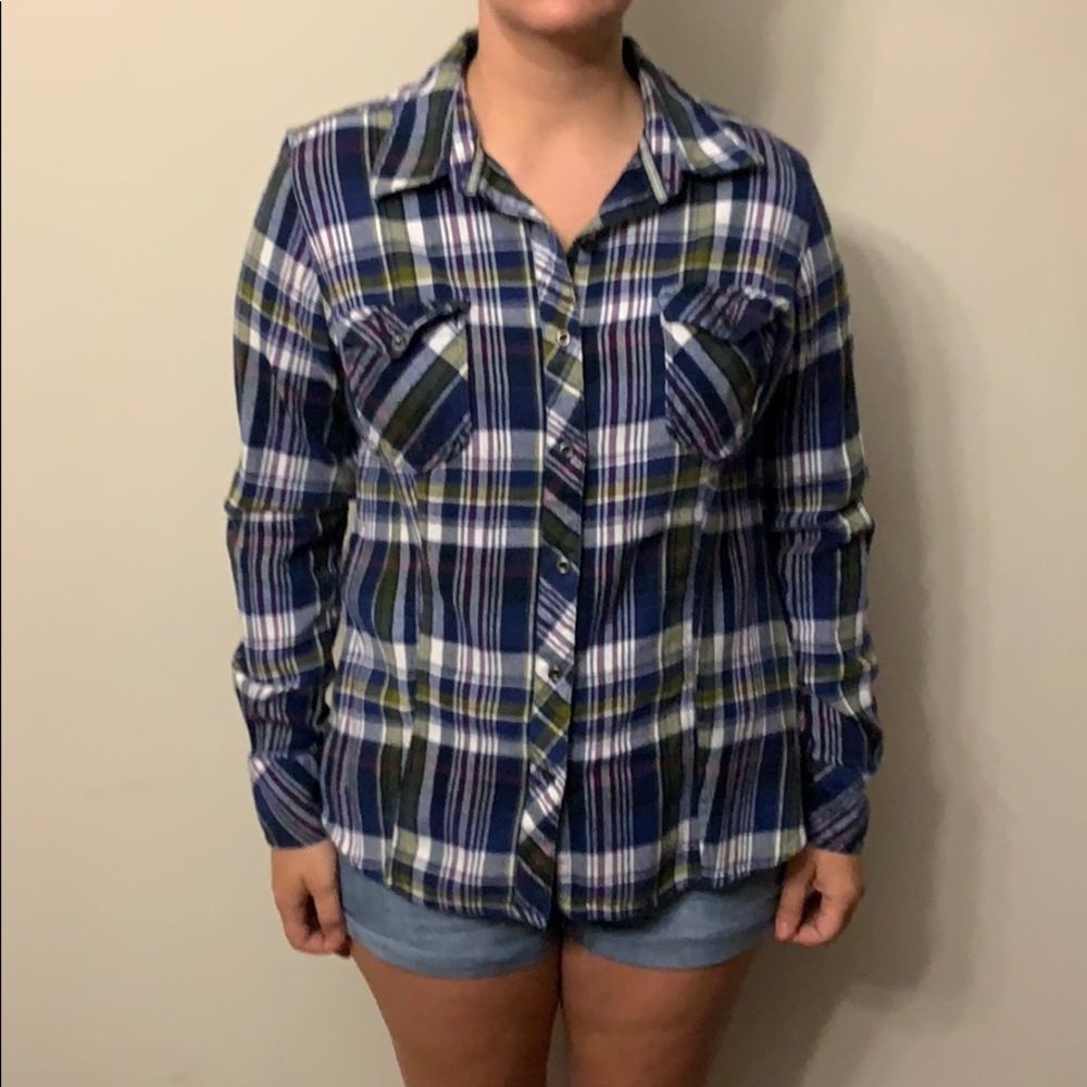 Plaid button up shirt.